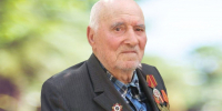 Вениамин Кондратьев поздравил со столетним юбилеем ветерана из Приморско-Ахтарского муниципального округа - Администрация Краснодарского края
